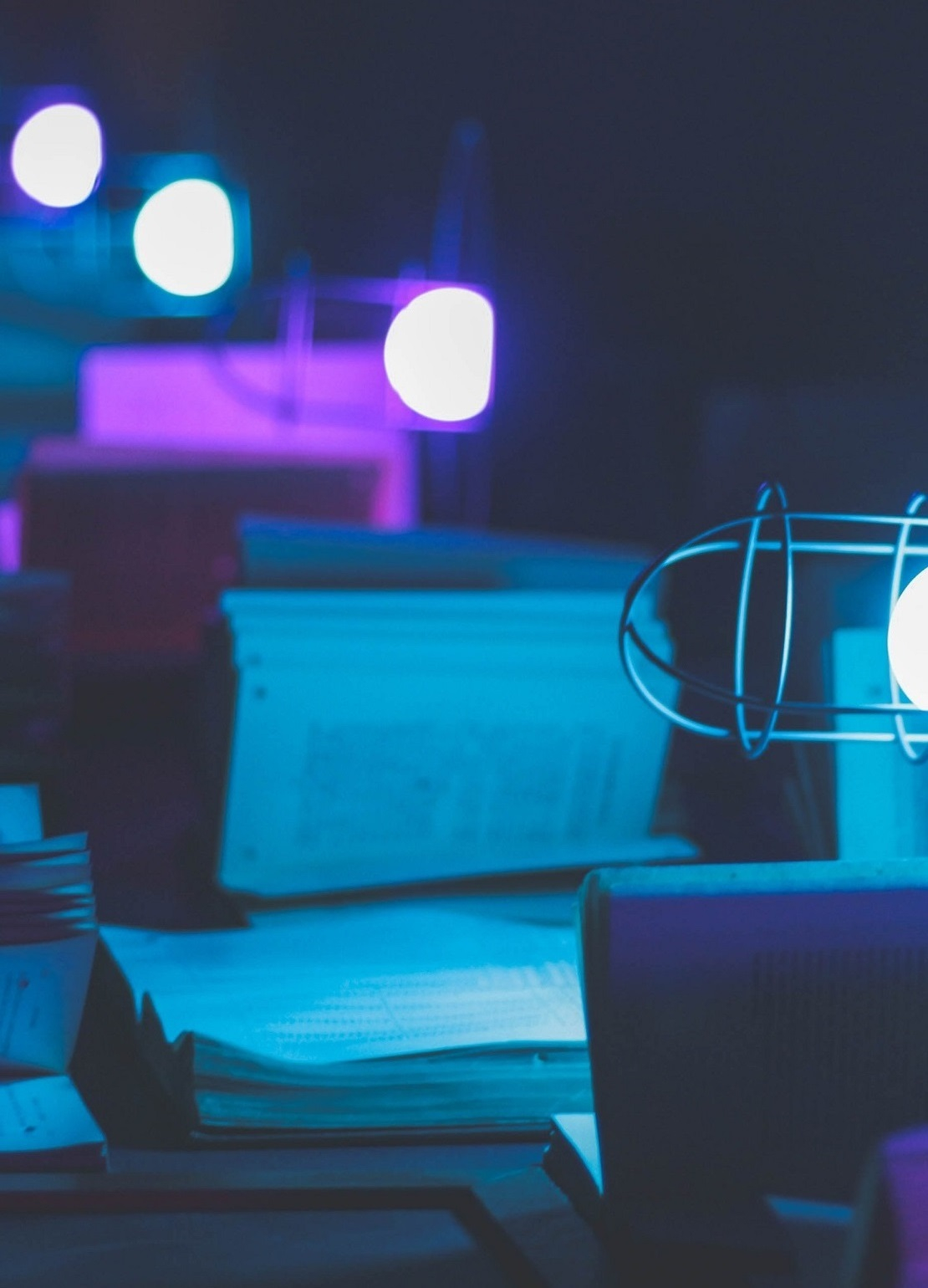 Books on a shelf with lights