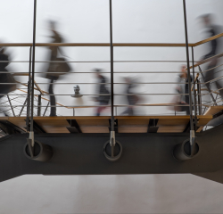 Image people walking down flight of stairs